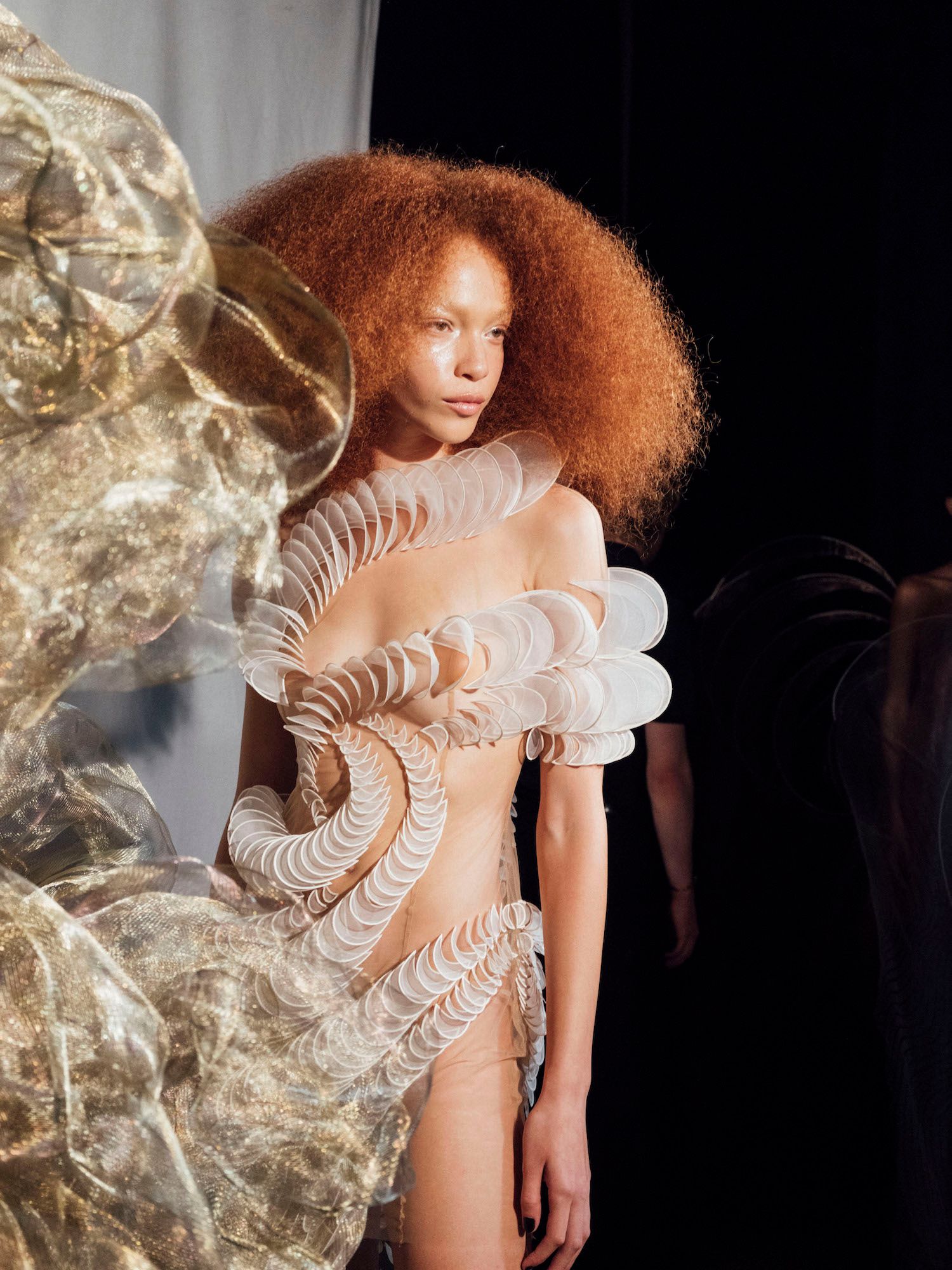A model wears a dress made of lab-grown bio-protein backstage at the Iris van Herpen Haute Couture Fall/Winter 2025 show on July 07, 2025 in Paris, France. (Photo: Emily Malan/WWD via Getty Images)