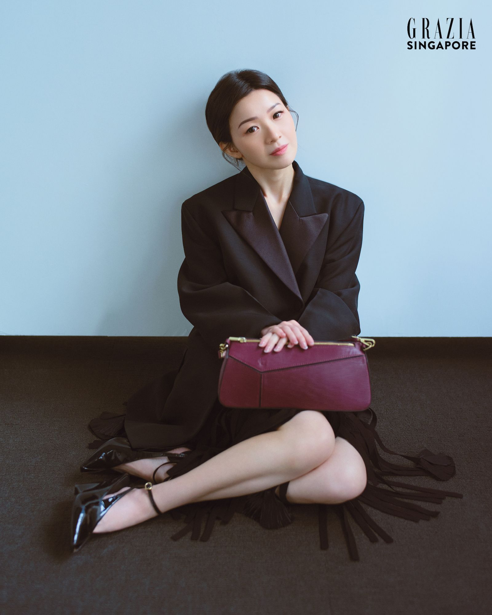 CLEMENTINE Stellar baguette bag; FERRAGAMO blazer, skirt, slingback pumps.