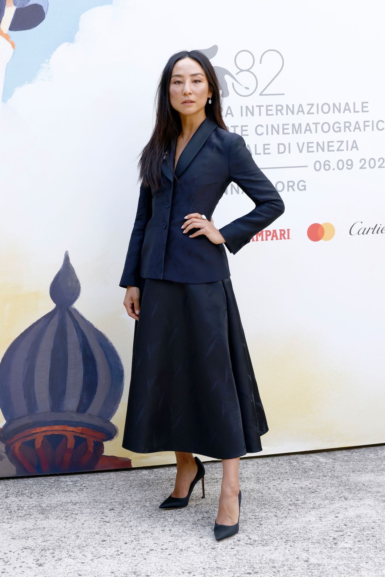 Greta Lee in a Dior Bar Jacket and skirt by Jonathan Anderson - Venice Film Festival 2025